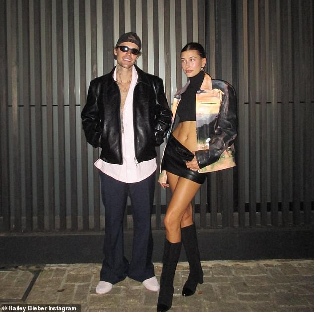 Model couple: Justin flashed a huge grin in an adorable photo of him posing with his supermodel wife