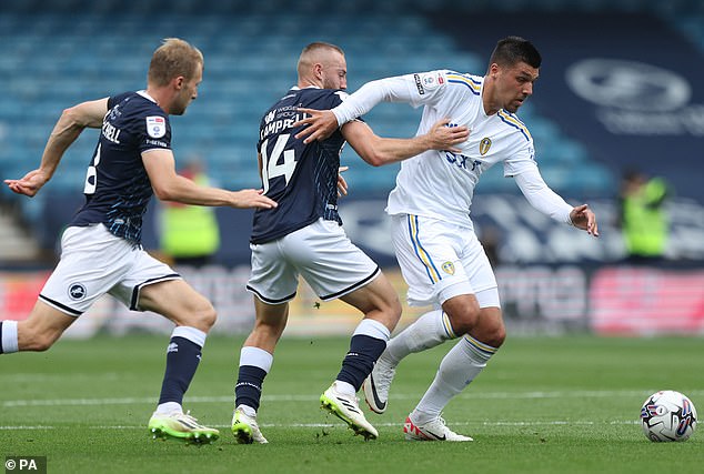 Leeds' Georginio Rutter tries to avoid Allan Campbell and Billy Mitchell (left).