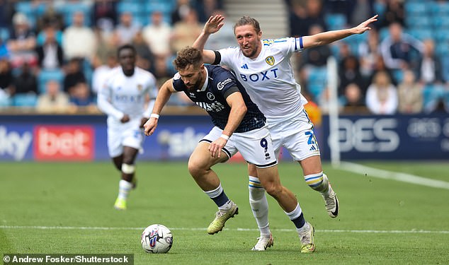 Leeds captain Luke Ayling chases Tom Bradshaw as the Millwall man tried to get away