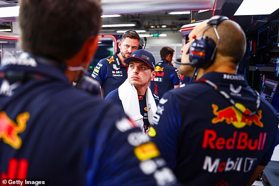 SINGAPORE, SINGAPORE – SEPTEMBER 17: Max Verstappen of the Netherlands and Oracle Red Bull Racing look on in the garage ahead of the F1 Grand Prix of Singapore at Marina Bay Street Circuit on September 17, 2023 in Singapore, Singapore.  (Photo by Mark Thompson/Getty Images)