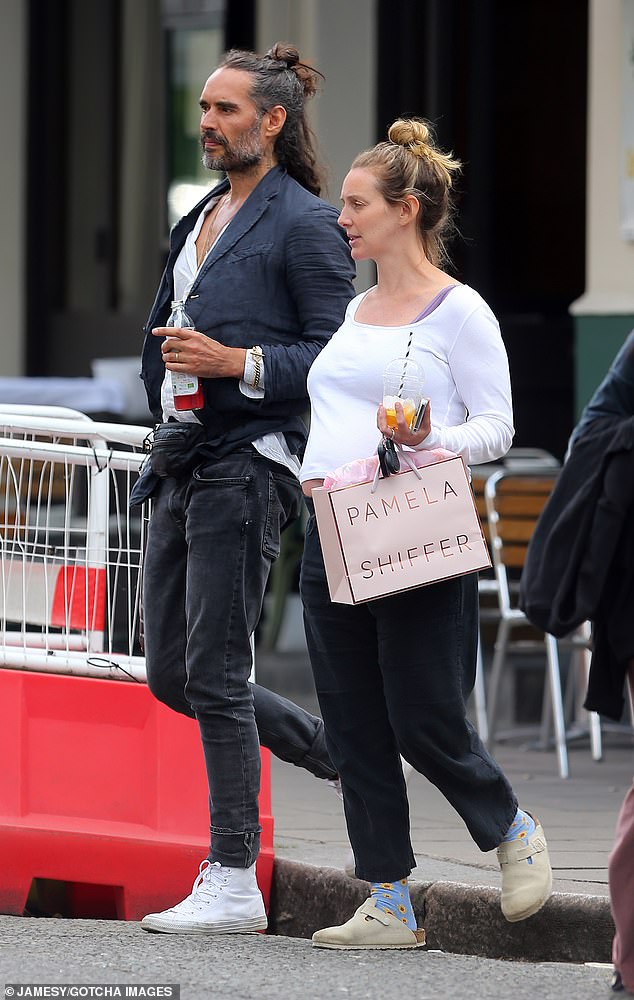 Despite her support for her husband, Mrs Gallacher (pictured shopping in London in July) set tongues wagging on Saturday when it emerged she had deleted her Instagram account.