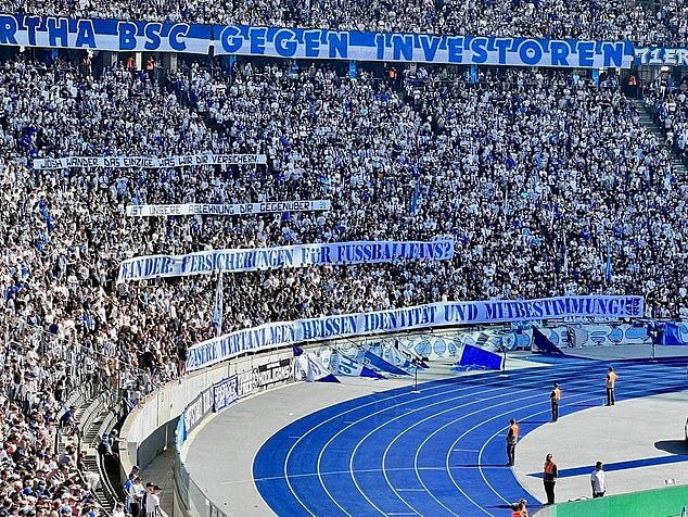 The sign read: 'Wander: Insurance for football fans?  Our investments are called identity and participation.  Josh Wander, the only thing we can assure you is our disapproval of you!”