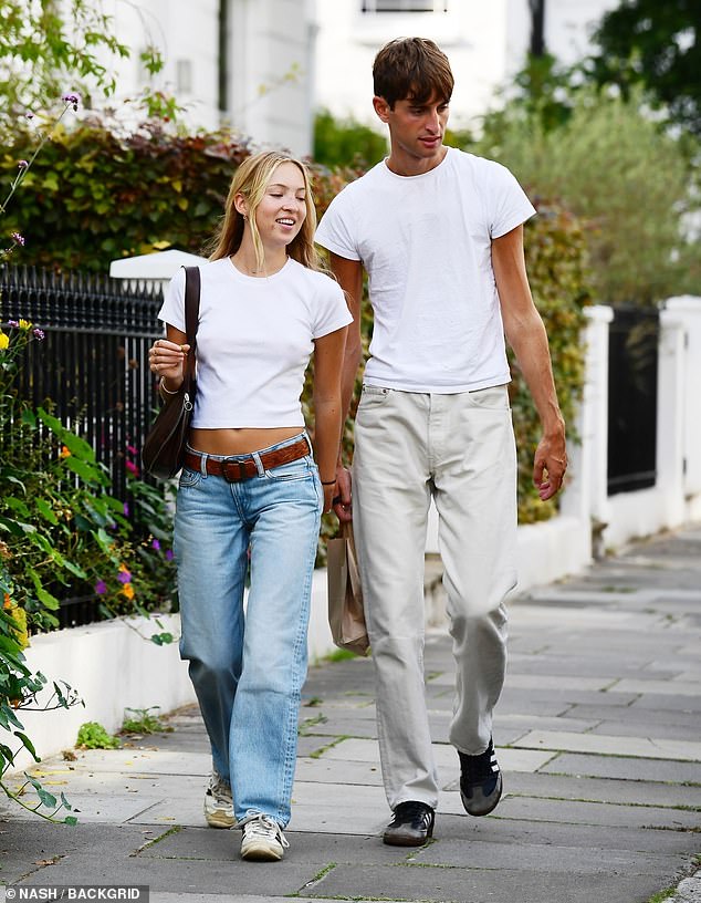 Looking good: model Lila, decorated with a brown belt and handbag