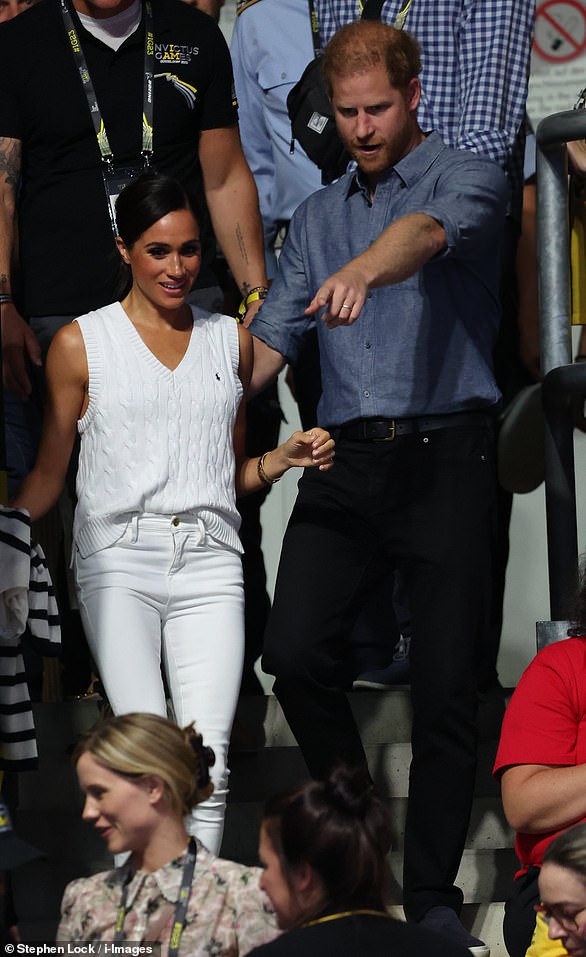 The Duchess wore a beautiful white Ralph Lauren sweater vest with matching jeans for the occasion