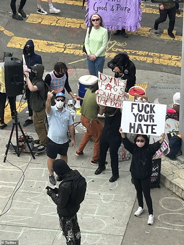 Some activists carried signs and posters, while others shouted 