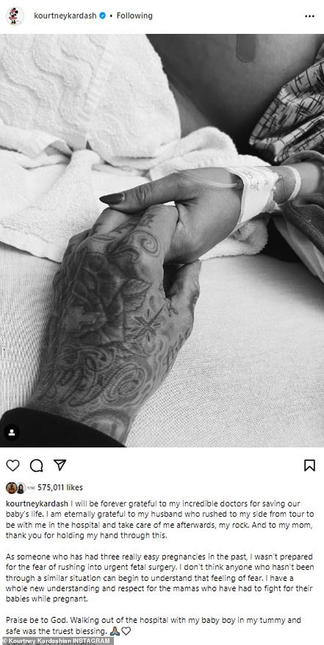 Surgery: The Kardashians star shared a black and white photo of her holding Barker's hand as she lay in a hospital bed and revealed to her 224 million Instagram followers what she had experienced