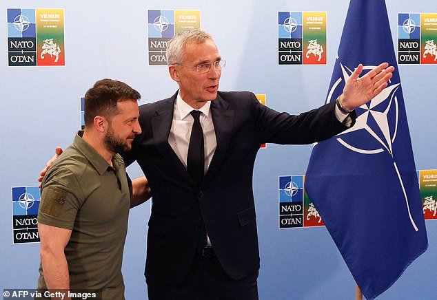 Mr Stoltenberg and Ukrainian President Volodymyr Zelensky pose for photographers ahead of a joint press conference on the sidelines of the NATO summit in Vilnius on July 12