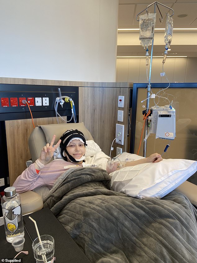 “They couldn't determine what I had until after the surgery, which is crazy,” she said.  The surgery itself was 'invasive' as it required an incision from her navel to her bikini line (photo during chemotherapy treatment)