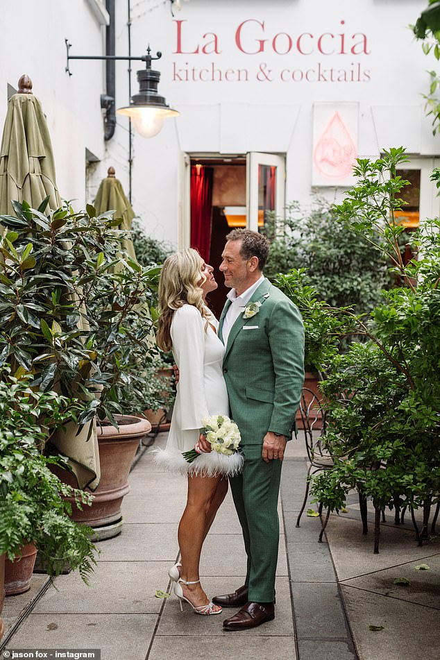 Celebrating: After saying 'I do', the newlyweds traveled in a white Hackney carriage to La Goccia, Covent Garden - where they celebrated with all their guests