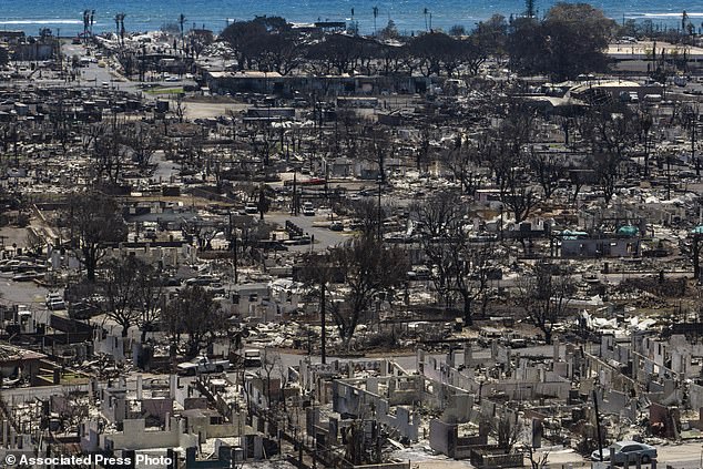 Charred remains of homes are visible after the Lahaina wildfire