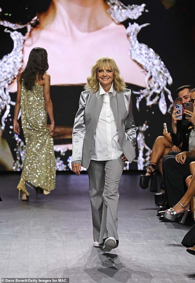 Icon: Twiggy made a stunning appearance as she walked with the runaway during the fashion show