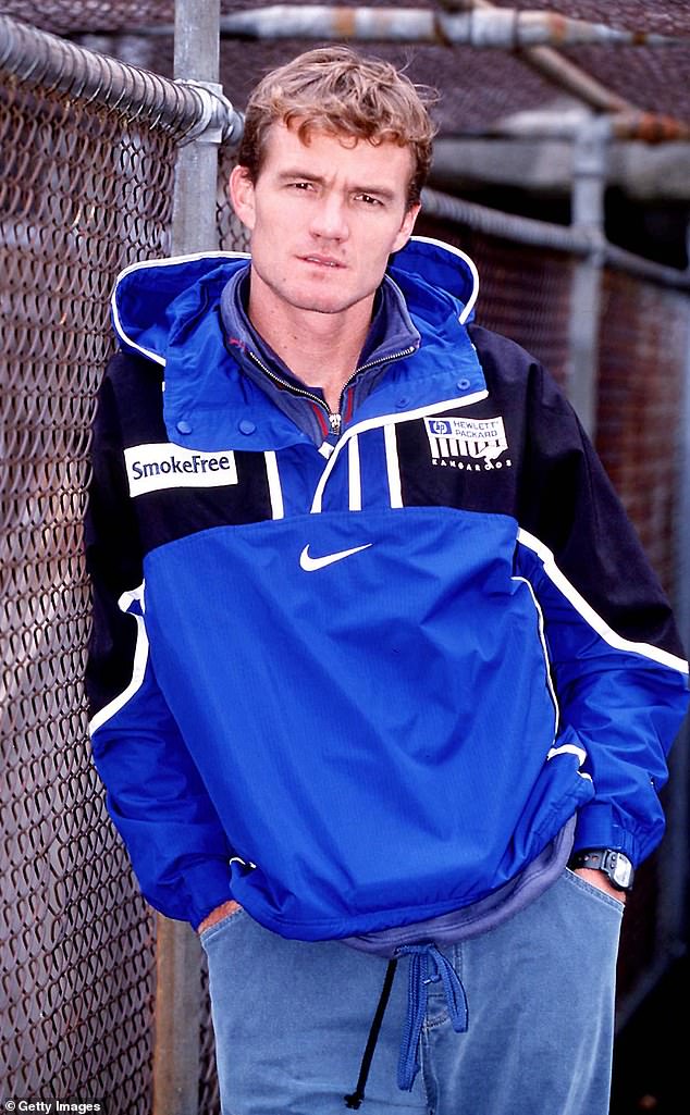 Laidley (pictured in 1998) reveals he risked exposing his double life to the world when coaching North Melbourne