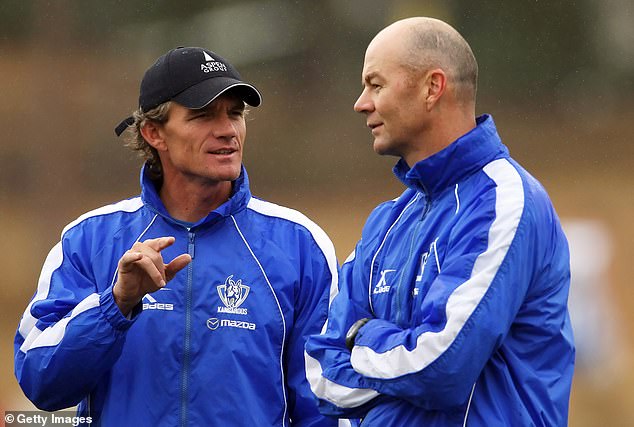 The ex-Kangaroos boss (pictured with his assistant coach Darren Crocker in 2009) is given a warm welcome by his ex-teammates before they open their eyes.