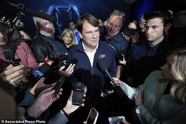 Jim Farley, president and CEO of Ford Motor Company, speaks to reporters about the UAW contract talks at the North American International Auto Show in Detroit last week