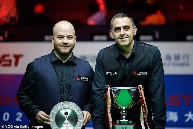 It was revenge against Luca Brecel (left) who defeated him earlier this year on his way to the world championship