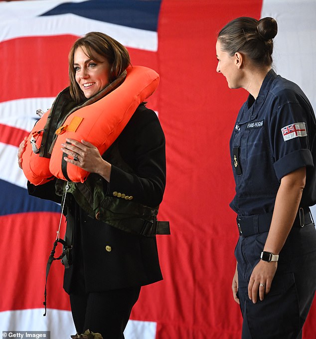 When Princess Kate demonstrated the life jacket, she looked a little restricted in her movements