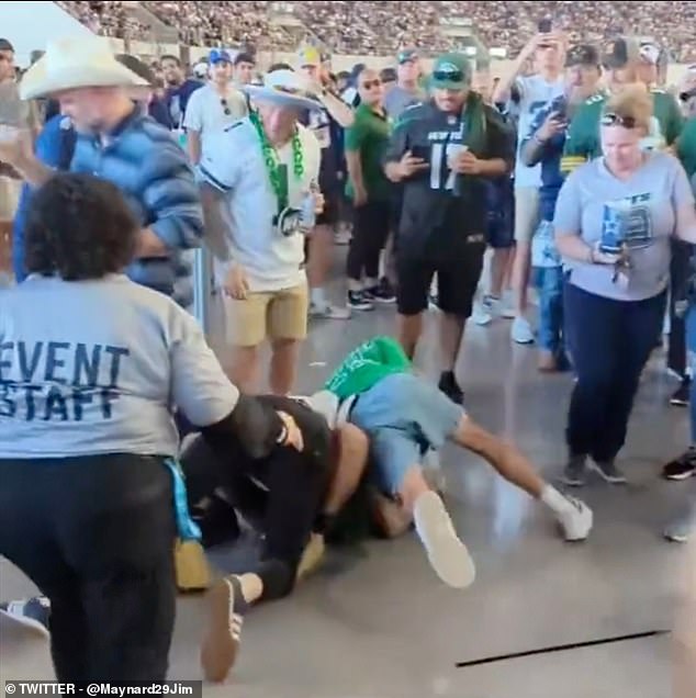 The trio were sent to the ground before the Cowboys fan involved was led away