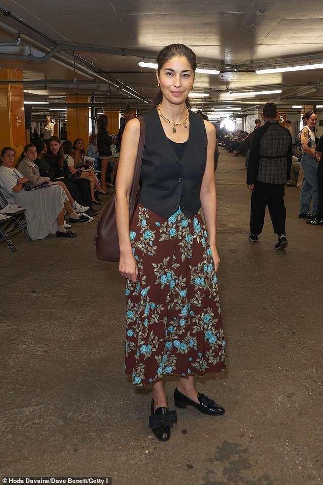 Flower power: Caroline Issa appeared in a structured vest and a floral skirt