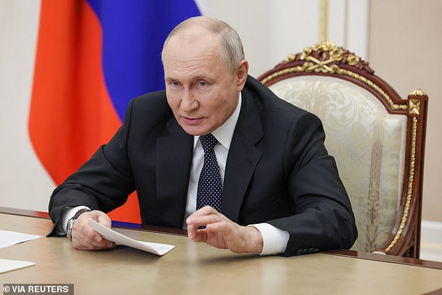 Russian President Vladimir Putin chairs a meeting on the draft federal budget for 2024 and the planning period of 2025 and 2026, via video link at the Kremlin in Moscow, Russia, September 18, 2023