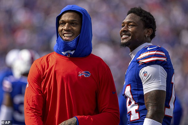 Damar Hamlin (left) is back on the Bills roster after suffering an on-field cardiac arrest