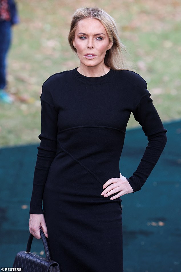 Incredible: Patsy styled her simple and classic outfit with opaque tights, a Chanel bag and accentuated her height with a pair of black heels