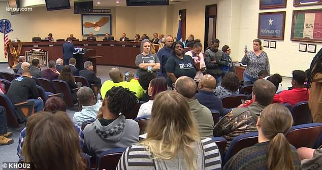 Activists turned their backs on speakers who defended Texas' high school long hair policy