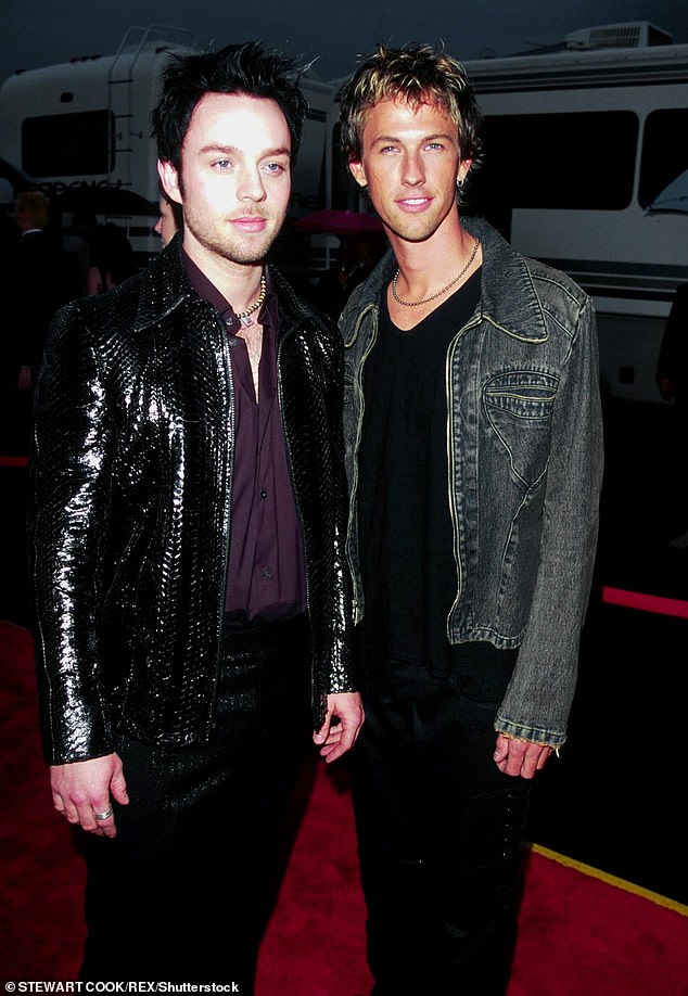 Savage Garden, made up of Darren and guitarist Daniel Jones (right), formed in 1993 and produced a string of number one hits, including To the Moon and Back and The Animal Song