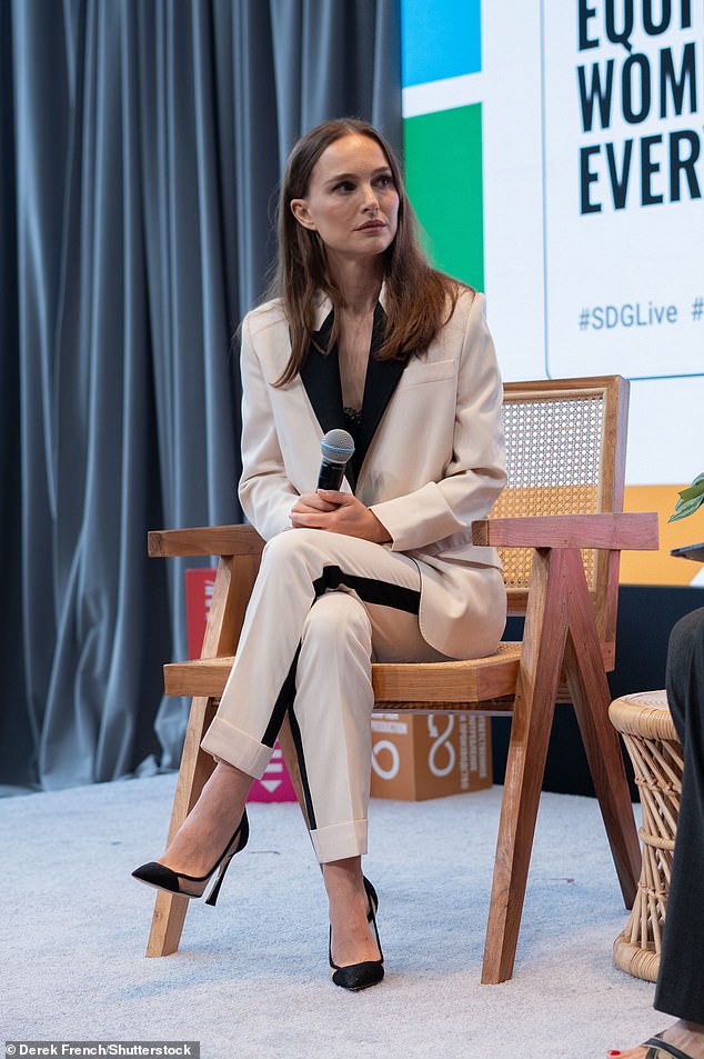 Staying focused: She left her brunette locks in a natural style and opted for a minimal makeup look to highlight her stunning facial features.  She refused any accessories and was noticeably seen without her wedding ring