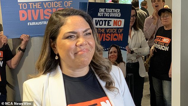 Senator Jacinta Price is pictured next to No supporters in Adelaide on Monday