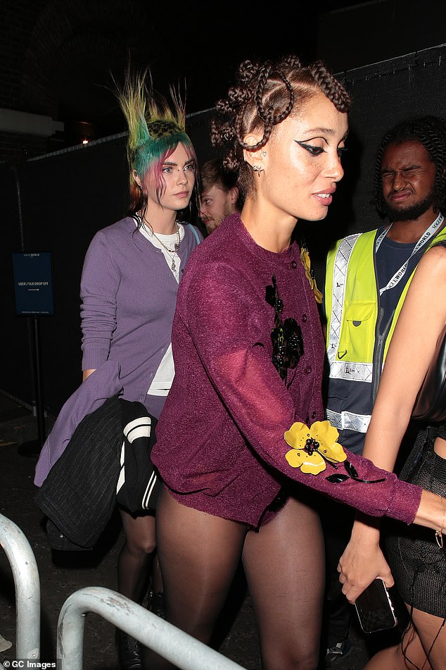 Bedtime!  Pale-eyed Cara Delevingne (L) and Emily Ratajkowski were led from Vogue World and Moncler's boozy after-party by model friend Adwoa Aboah (R) in London on Thursday