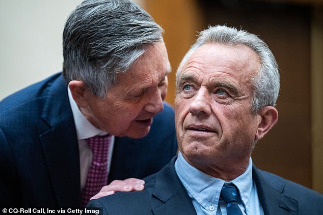 Dennis Kucinich (left), the former Ohio congressman who now works for Robert F. Kennedy Jr.'s campaign manager, wrote to Biden asking for protection for his candidate