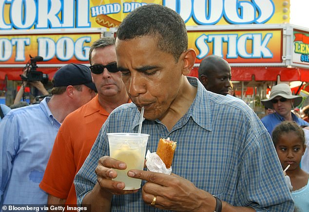 Barack Obama at the Iowa State Fair in August 2007 during the 2008 presidential campaign;  a secret service agent is visible behind him;  Obama received early protection due to threats