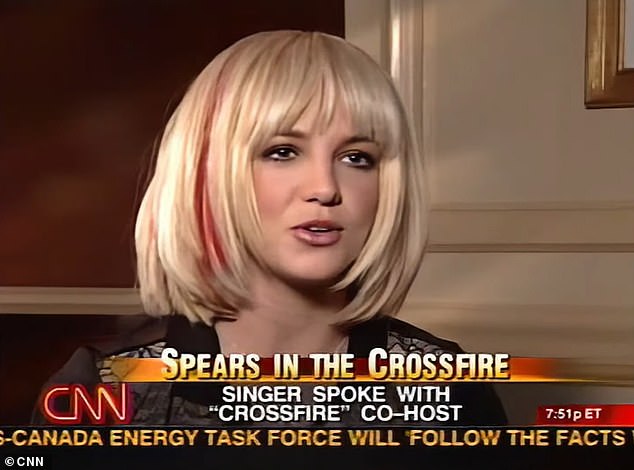 The original: Kardashian, 39, wore a short blonde wig to recreate the 41-year-old pop star's 2003 interview with CNN;  Britney pictured in a still from the interview