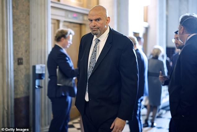 Sen. John Fetterman, seen above in May, wore a suit and tie to the Senate