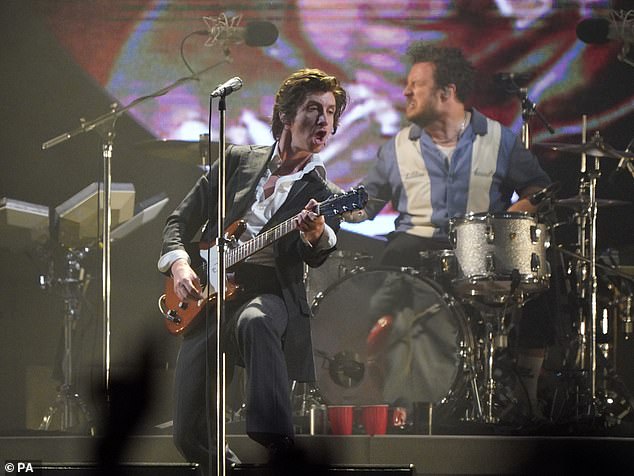 Disappointing: The band, which also includes Alex Turner, Jamie Cook and Nick O'Malley, took to the stage at the Glastonbury Festival in June, but their performance provoked mixed reactions