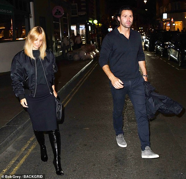 Let's go: The singer, single after her split from ex-footballer Jamie Redknapp in 2017, was joined by Drew as they left close friend Carr's festive bash