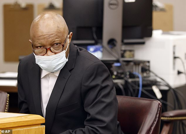 Defendant Billy Chemirmir listens to moves in his murder trial at the Frank Crowley Courts Building in Dallas, Friday, November 19, 2021