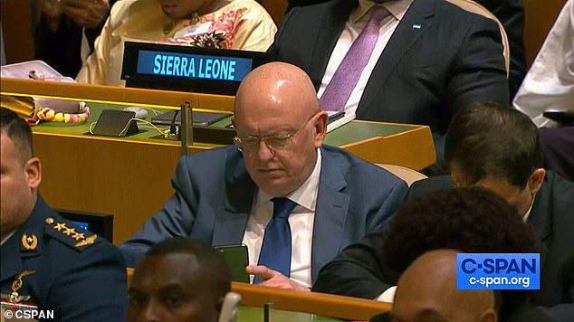 Russia's Ambassador to the United Nations, Vaisily Nebenzya, was captured looking at his phone as President Joe Biden addressed the United Nations General Assembly on Tuesday and criticized Russia for invading the 'Ukraine.