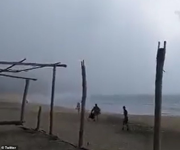 Two people were struck by lightning and killed on Monday on a beach in Aquila, a city on the Pacific coast in the Mexican state of Michoacán.