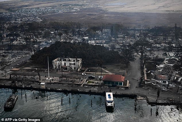 The historic tree remained standing amid the carnage but appeared badly burned following the West Maui wildfires.