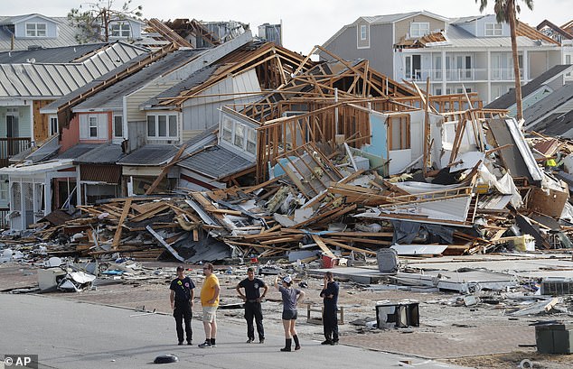 In Florida, one of the most common measures imposed on homeowners insurance is a 2% deductible for hurricane losses.  The photos show rescue workers conducting searches following Hurricane Michael in Mexico Beach, Florida, in 2018.