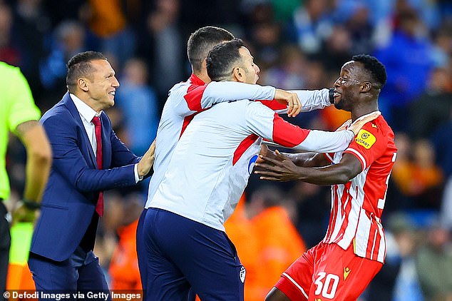 He and his teammates were delighted and went to the bench to celebrate with the staff.