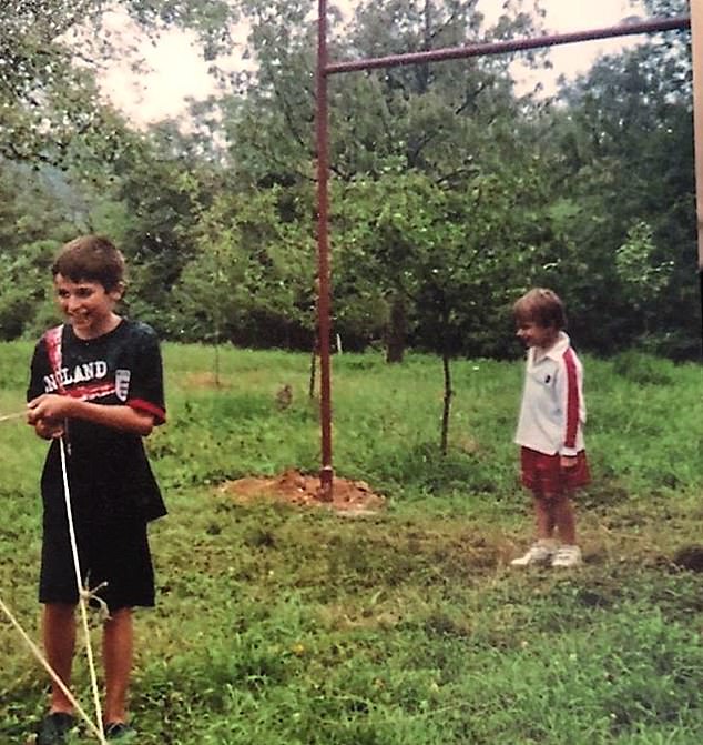 A young Theo Dan (white top) in his grandparents' garden, southwest Romania