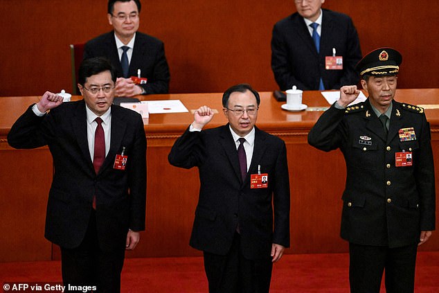 Qin, far left, was elected state councilor on March 12 this year.