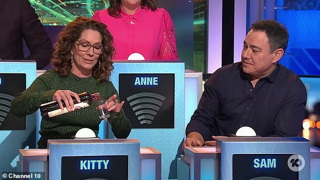 The comedian, 49, appeared on the show with Kitty Flanagan (left).  Flanagan brought a bottle of alcohol sent by a Danish fan, and she poured a shot for herself and Pang.