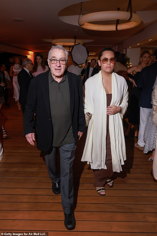 Child support checks: De Niro has made several commercials in recent years following his costly 2018 divorce from Grace Hightower and his separation from the mothers of his children.  He welcomed his seventh child with partner Tiffany Chen (pictured together in May in Cap d'Antibes, France)