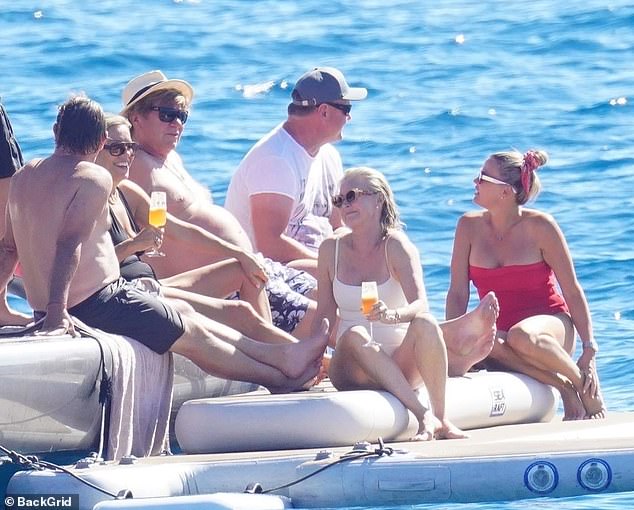 The lovebirds stripped down to their bathers as they dipped their toes in the water with their gang of wealthy friends on the exclusive French Riviera coastline