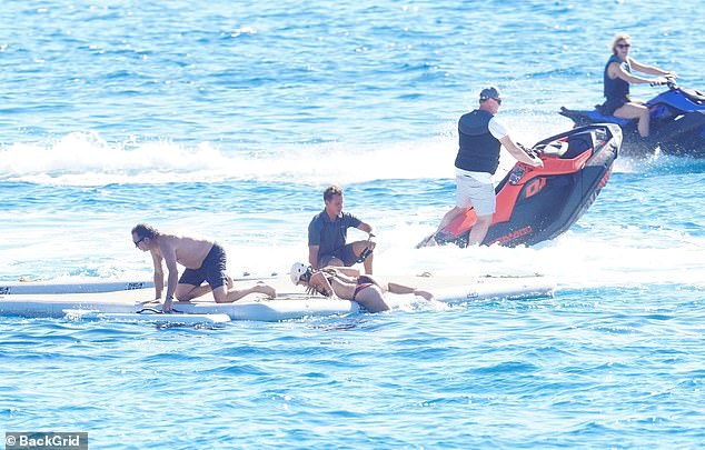 The group of friends lived up to the party by deploying inflatable platforms on the water and jumping on a few jet skis.