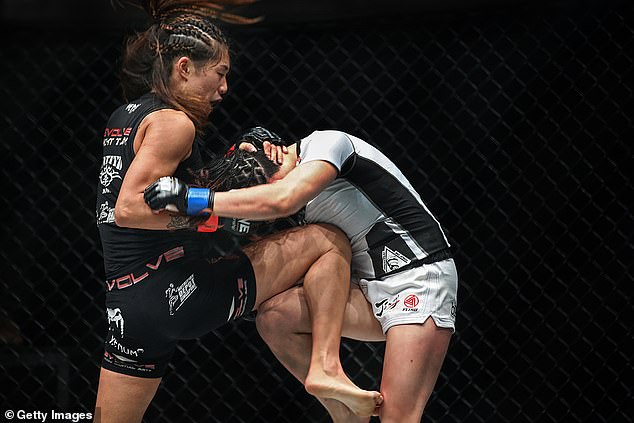 Lee (left) is the current ONE Atomweight World Champion.  Pictured fighting Jenny Huang in 2017