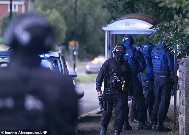 Armed police were called to Handsworth Road in east Sheffield after a man was attacked by a dog.